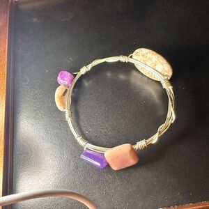 Twisted silver bracelet with stones